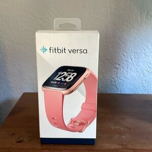 Fitbit Versa , smartwatch. Peach